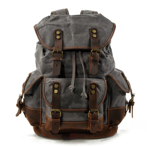 Zaino Uomo Casual in Tela e Pelle – Grande Capacità per Viaggi, Scuola e Attività Outdoor